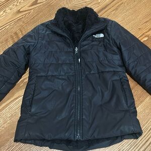 Girls NorthFace (size 10-12) reversible jacket. Black and fluffy inside.